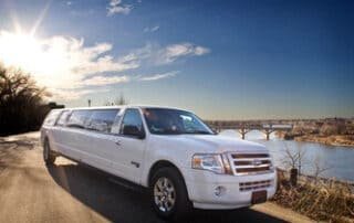 Corporate travelers using executive limousine service for airport transportation and business events